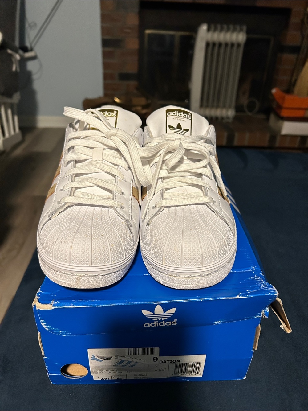 adidas Men’s White Sneakers with Gold Stripes